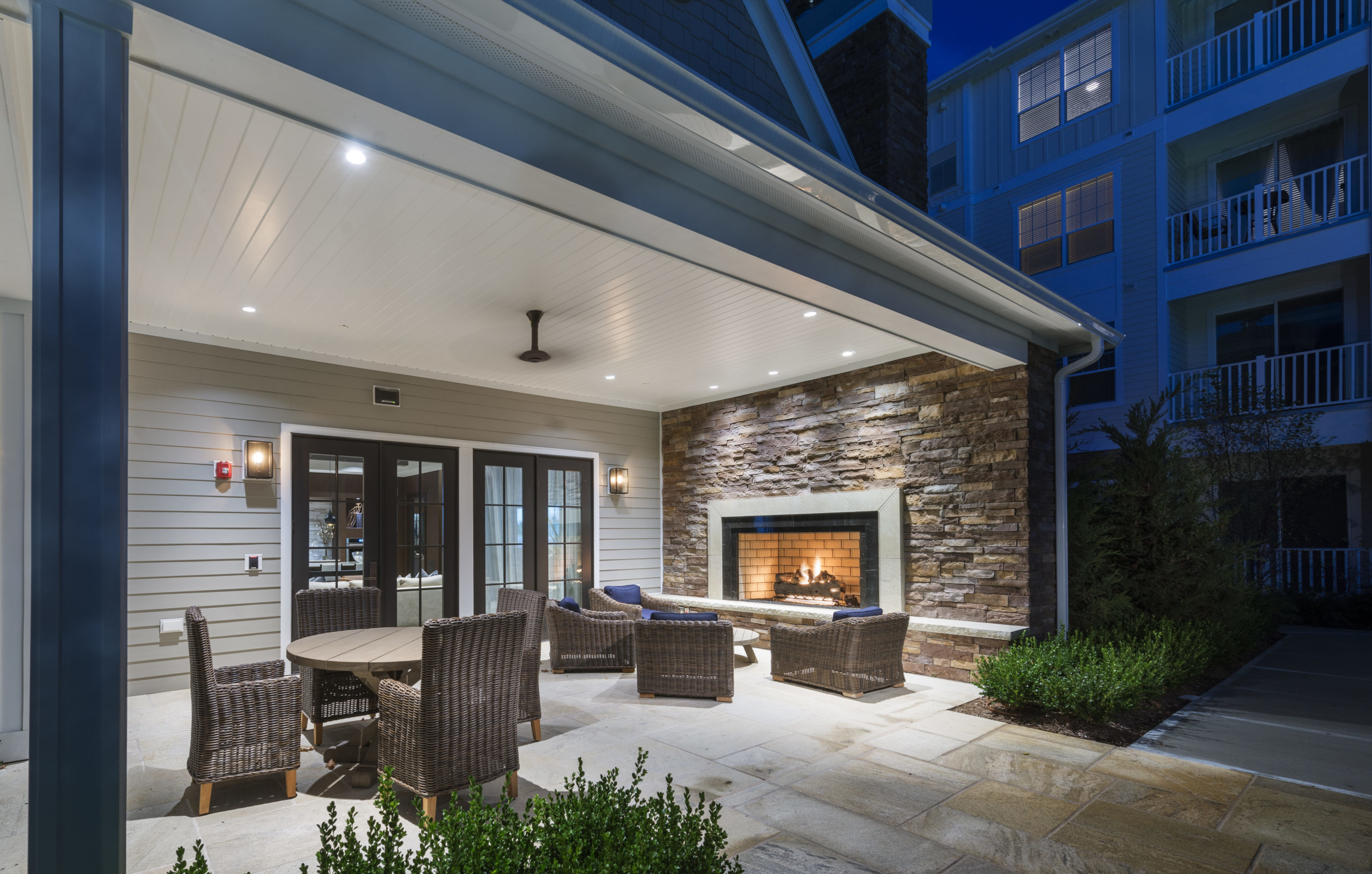 Outdoor fireplace and seating at The Point at Merrimack River