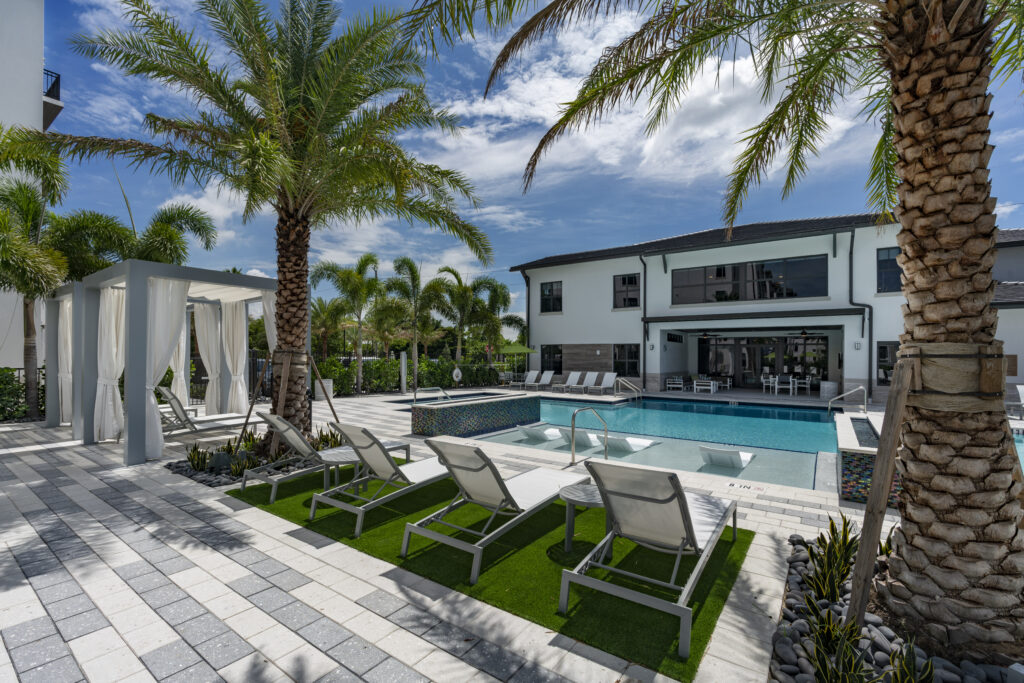 Outdoor pool and cabanas at The Point at Doral