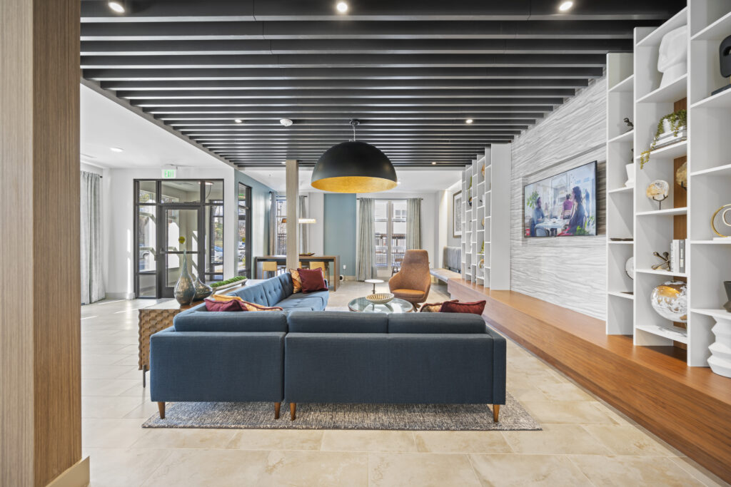 Community Clubroom with modern seating at The Point at Merrimack Valley